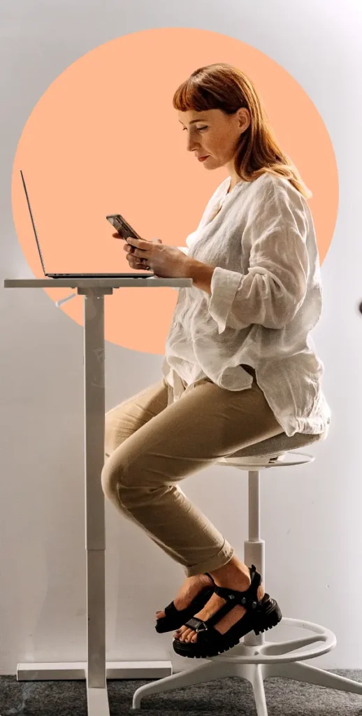 Pregnant woman looking at phone